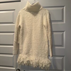 Elegant Cream Turtleneck Dress with Fringe